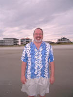 Joe enjoying a walk on the beach