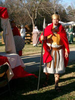 Roman soldiers on guard inside gateway to the town.