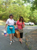 Thu Oanh's photo of Ruth & Vi, with Vi's SUV in back.