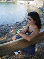 Thu Oanh enjoys the lake breeze after our picnic.
